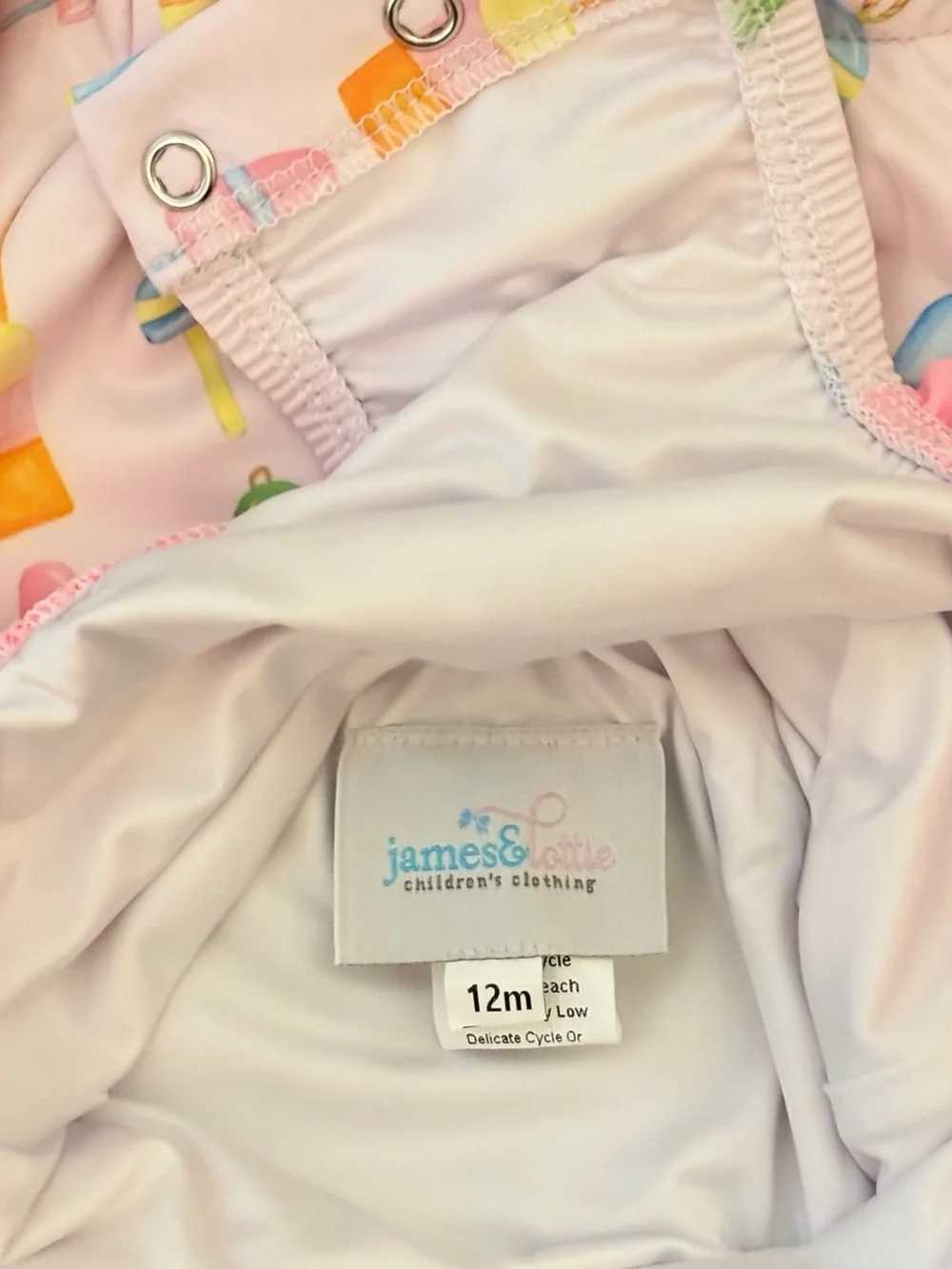 EUC James & Lottie Leighton One Piece Reel Fun Rashguard Size 12 Months